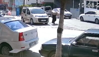 Yolda yürürken üzerine halı düştü
